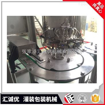 揭秘高效生產(chǎn)核心 沖洗、灌裝、封口三合一飲料包裝機(jī)